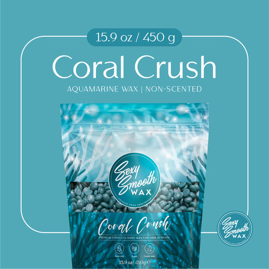 A retail package of Sexy Smooth Wax Coral Crush aquamarine wax beads, shown against a solid teal background with product information text above. The package is a resealable stand-up pouch with a clear window displaying blue-green wax beads, and the brand logo is prominently visible.