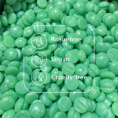 Green Emerald Enchantment hard wax beads highlighting the rosin-free, vegan-friendly, and cruelty-free formula.